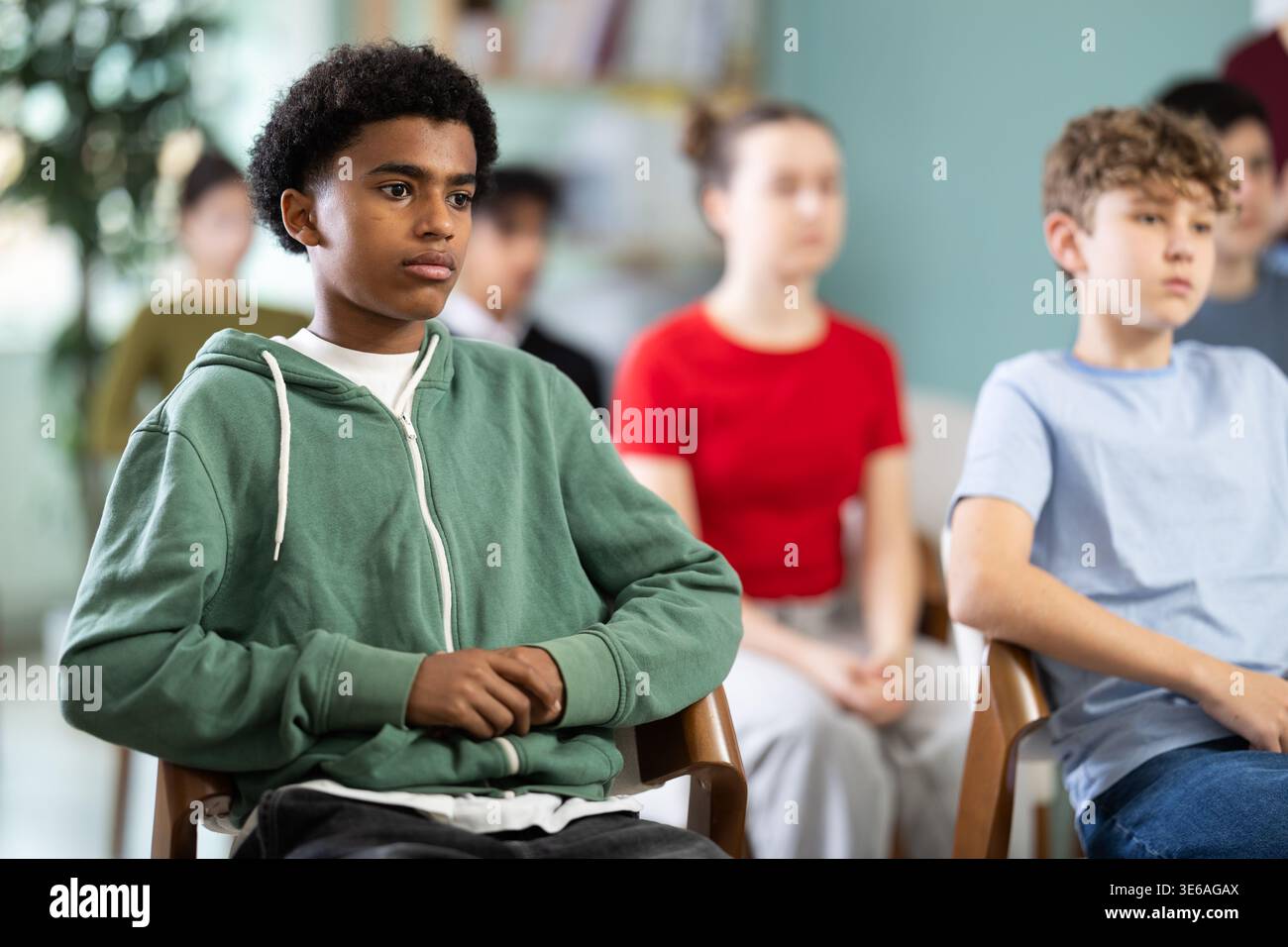 Lecturing Boy African American teen boy attendee group class and listen to lecturer ...
