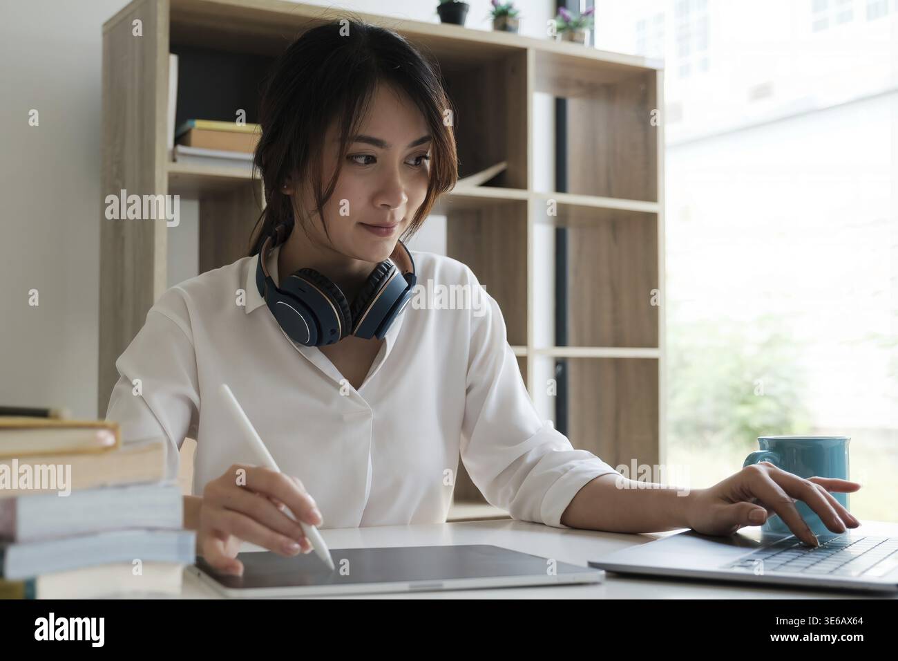 User experience concept. Creative Web Designer sketching application and developing template layout on laptop, framework for digital devices Stock Photo