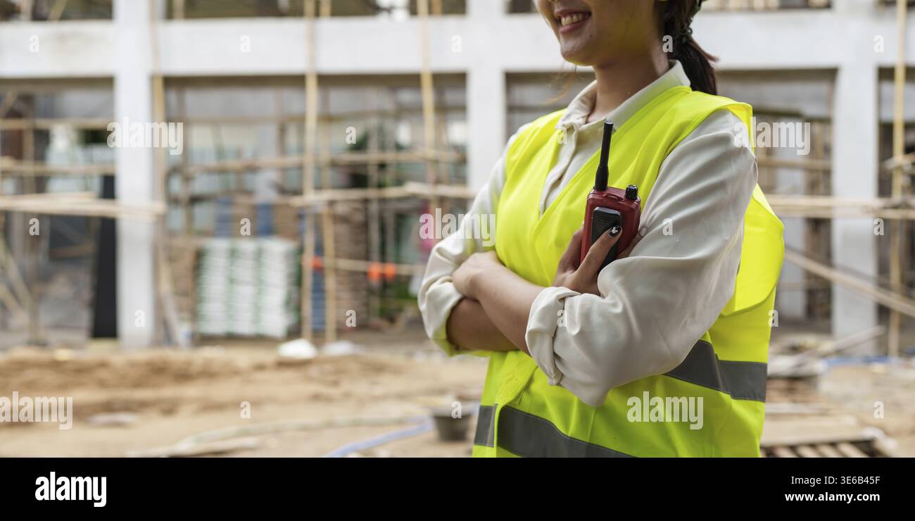Engineers are checking the quality at the outdoors construction site Stock Photo