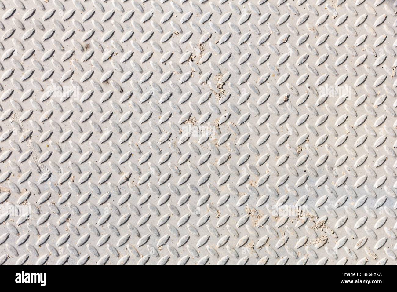 A top down view of a diamond plate pattern, as a background. Stock Photo