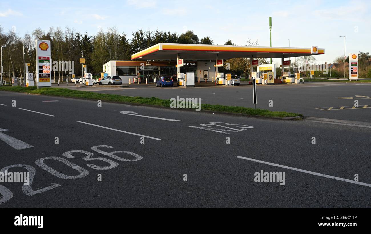 Shell gas station sign showing hi-res stock photography and images