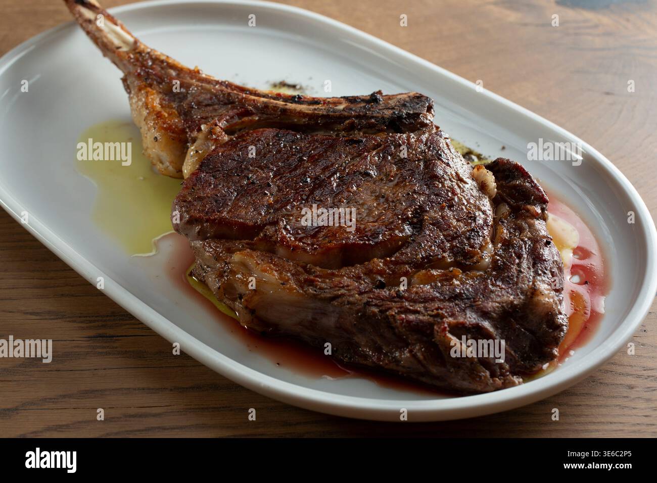 A view of a tomahawk steak. Stock Photo