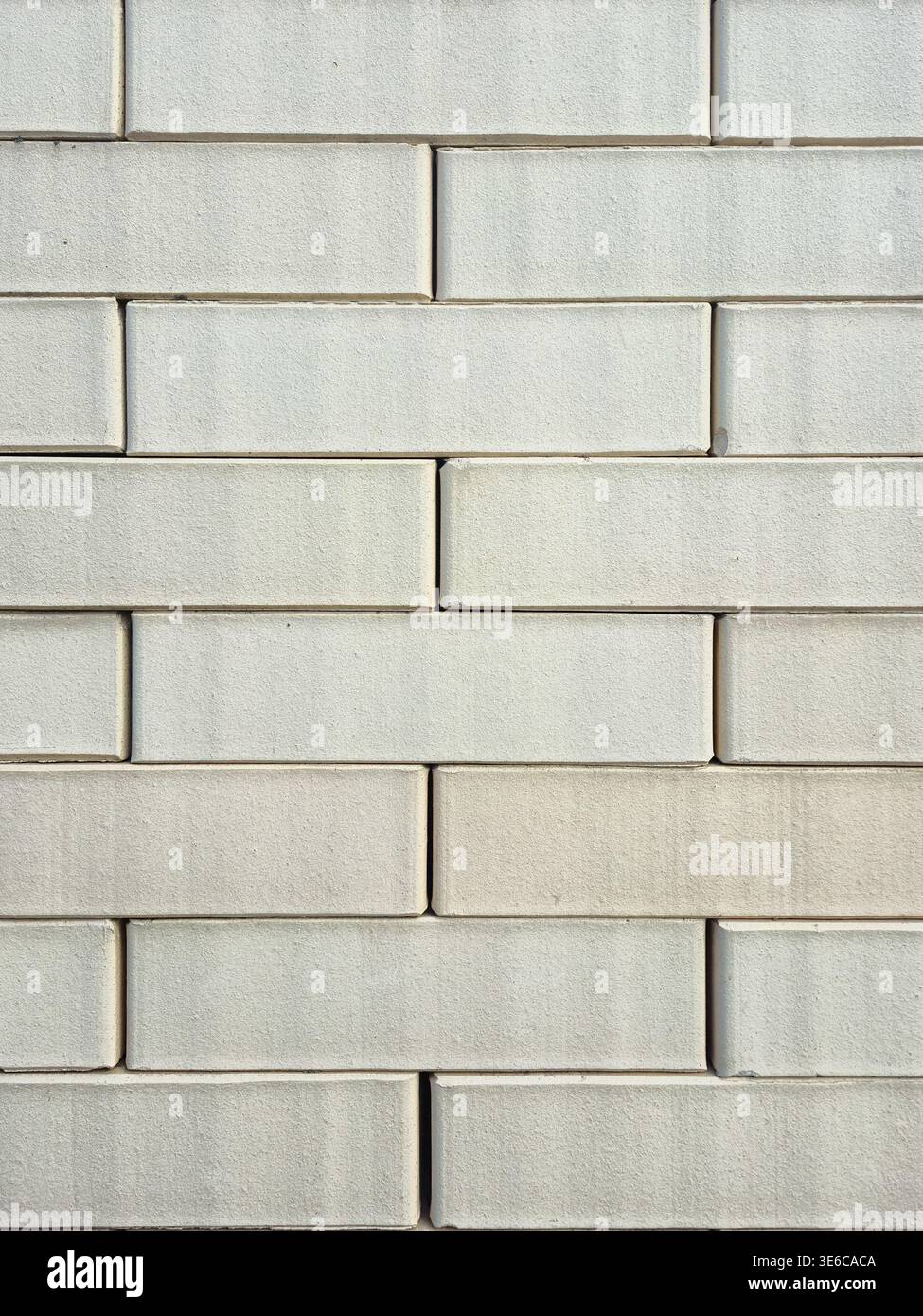 Modern light grey brick wall texture with clean horizontal lines Stock Photo