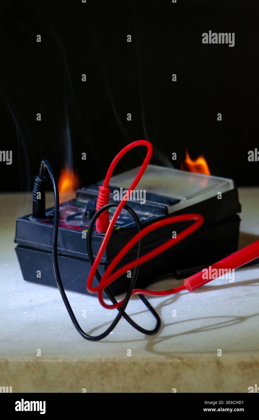 Multimeter Fire Smoking multimeter with wires after fire short circuit and overload ...