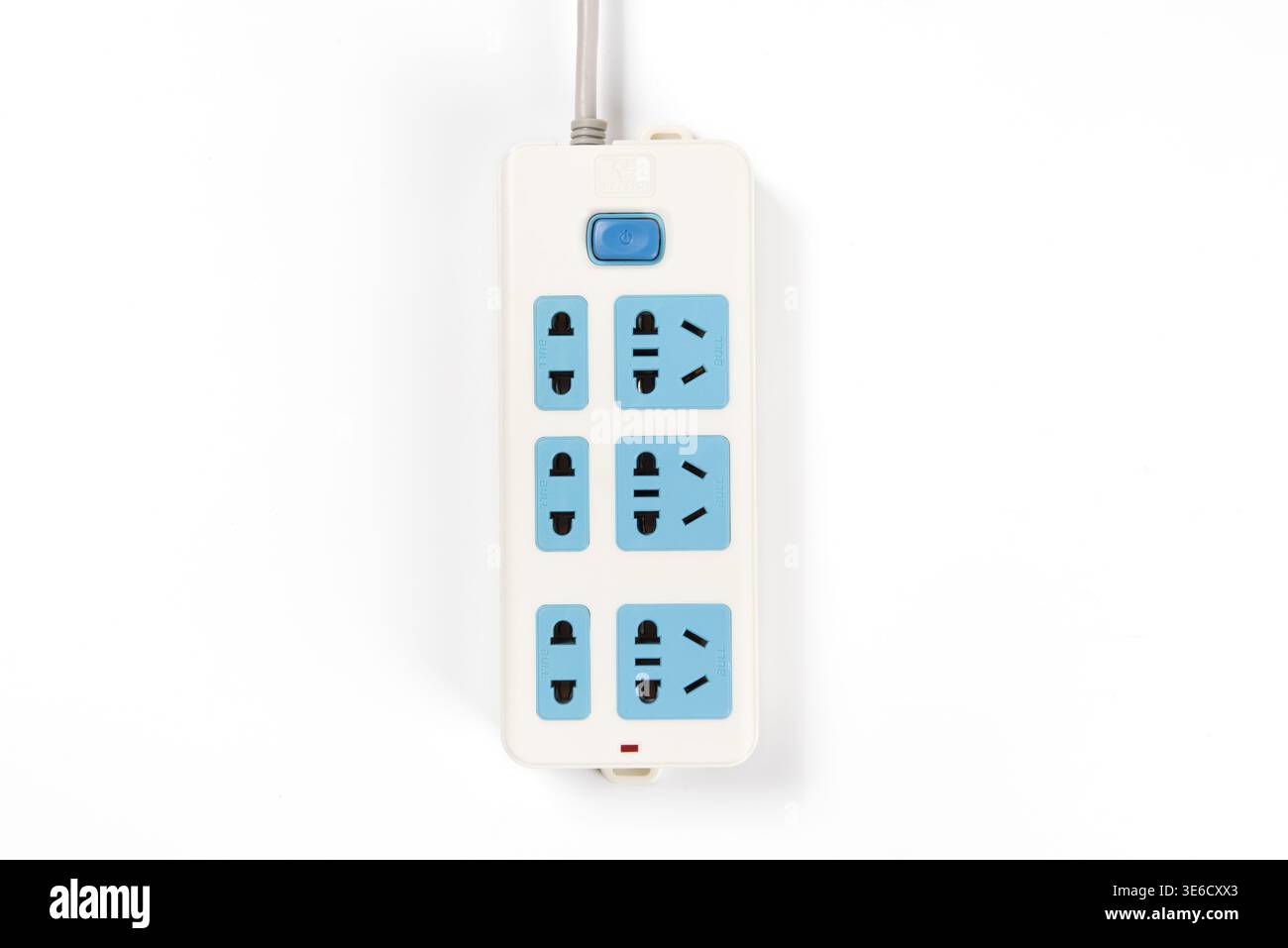 Power strip with multiple universal sockets and a blue power button on white background Stock Photo