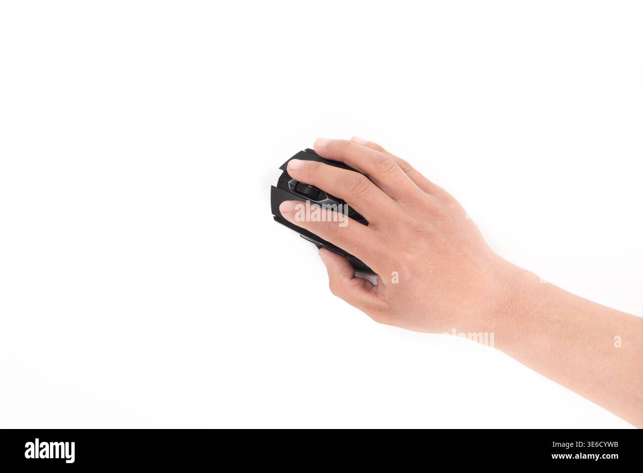 Hand holding and operating a black wireless computer mouse on a white background Stock Photo