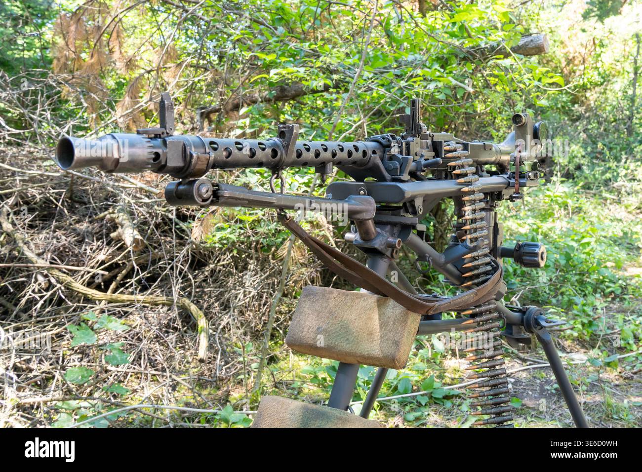WWII German MG 34 machine gun with ammunition and military equipment ...