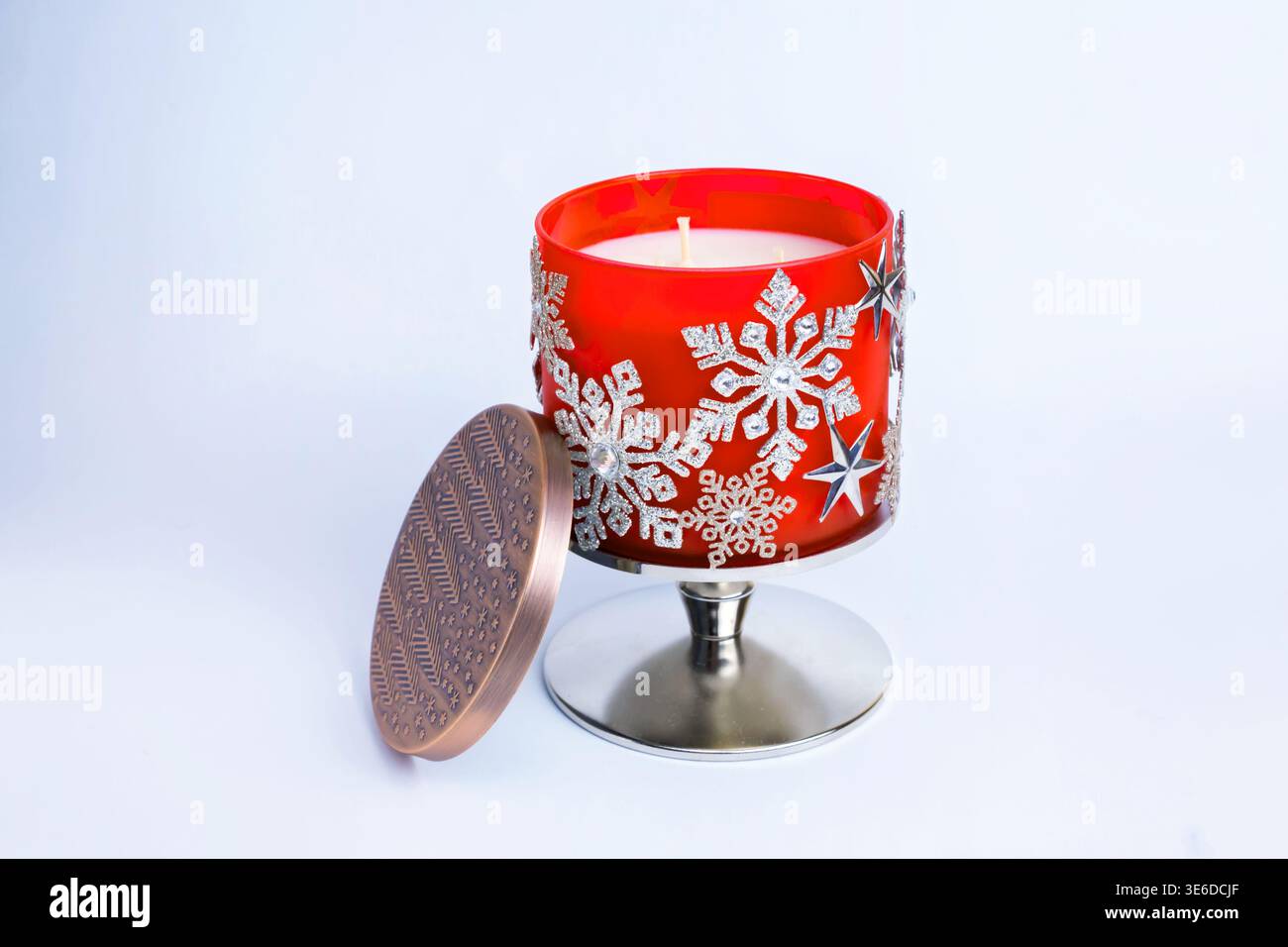 New Year's beautiful decorated snowflakes candlestick on a white background. Stock Photo