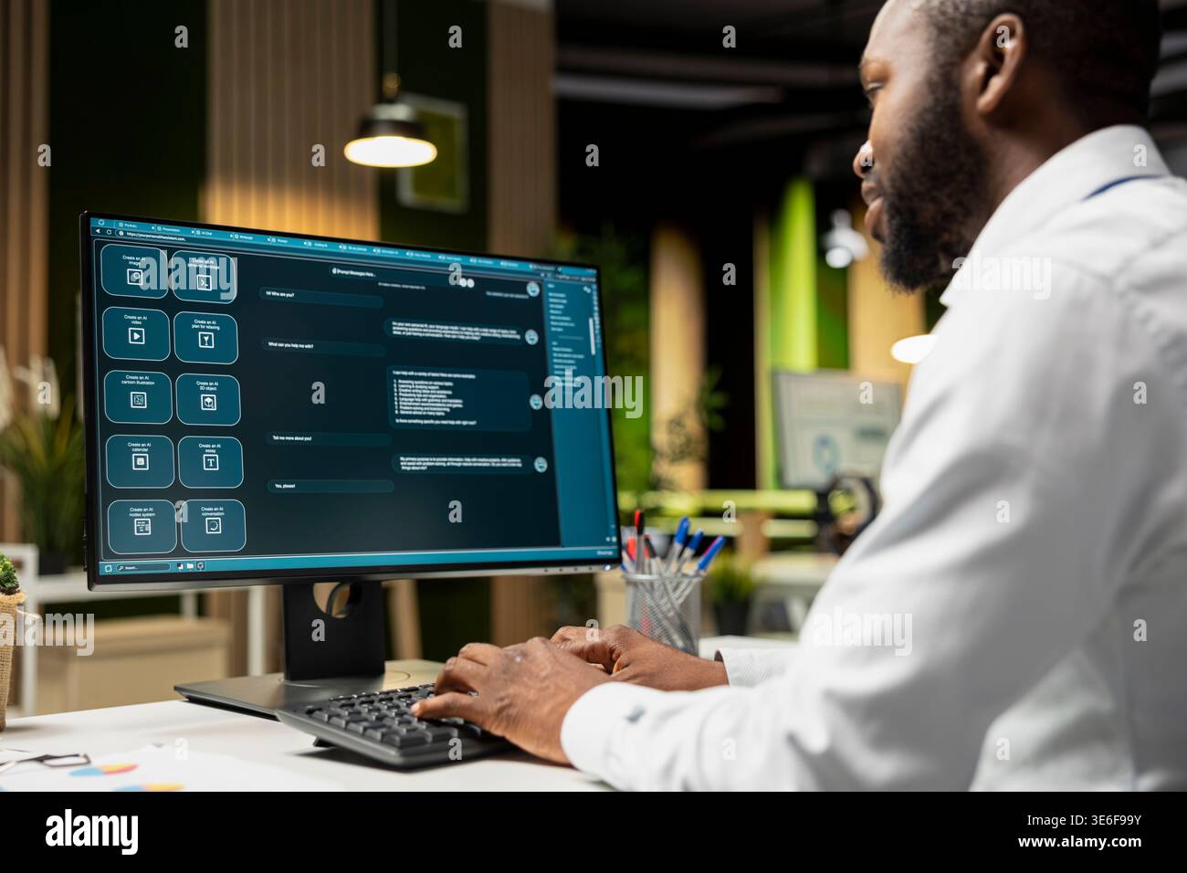Black programmer developing an app and software algorithm on pc, working in the office late at night. Engineer uses digital tools and focuses on script engineering and coding, IT specialist. Stock Photo