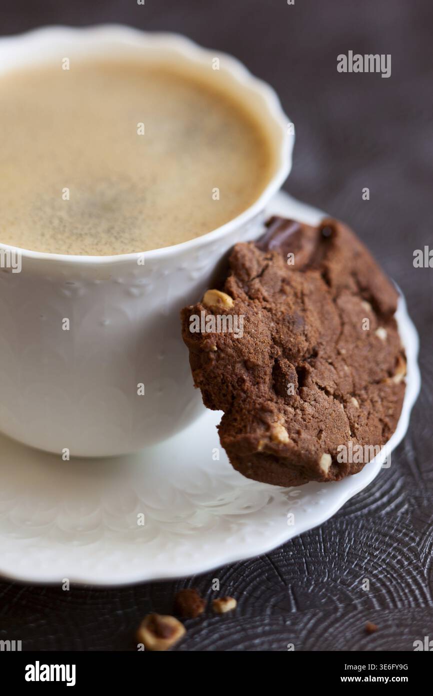 Chocolate and hazelnuts cookies with coffee Stock Photo