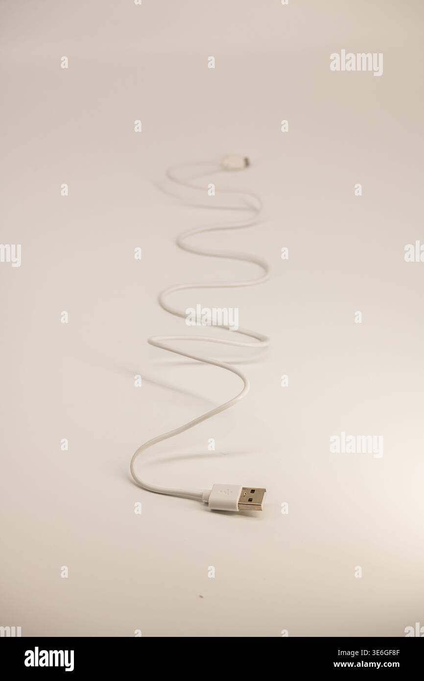 Cable with micro USB and USB connectors on a white background with clipping path. Stock Photo