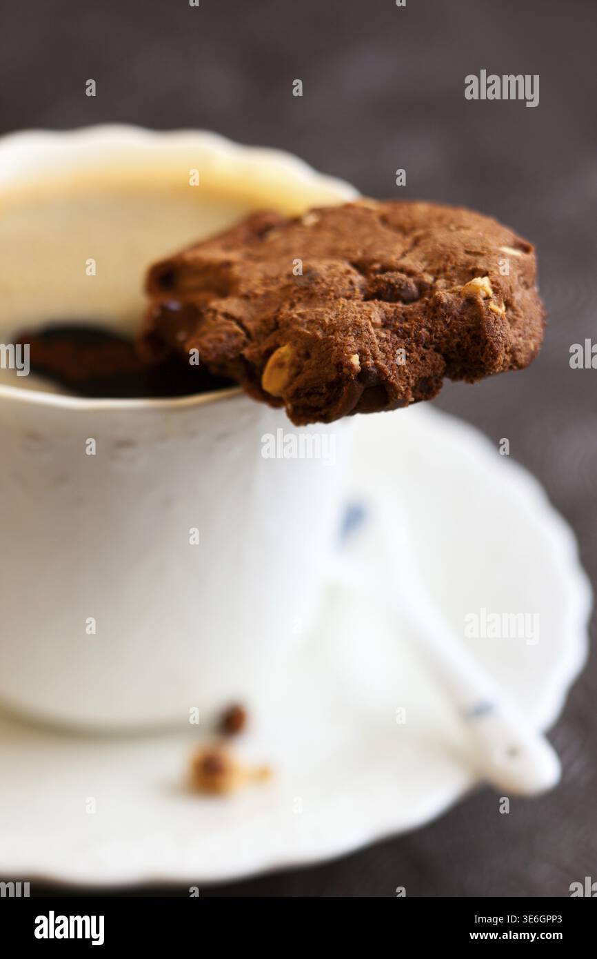 Chocolate and hazelnuts cookies with coffee Stock Photo
