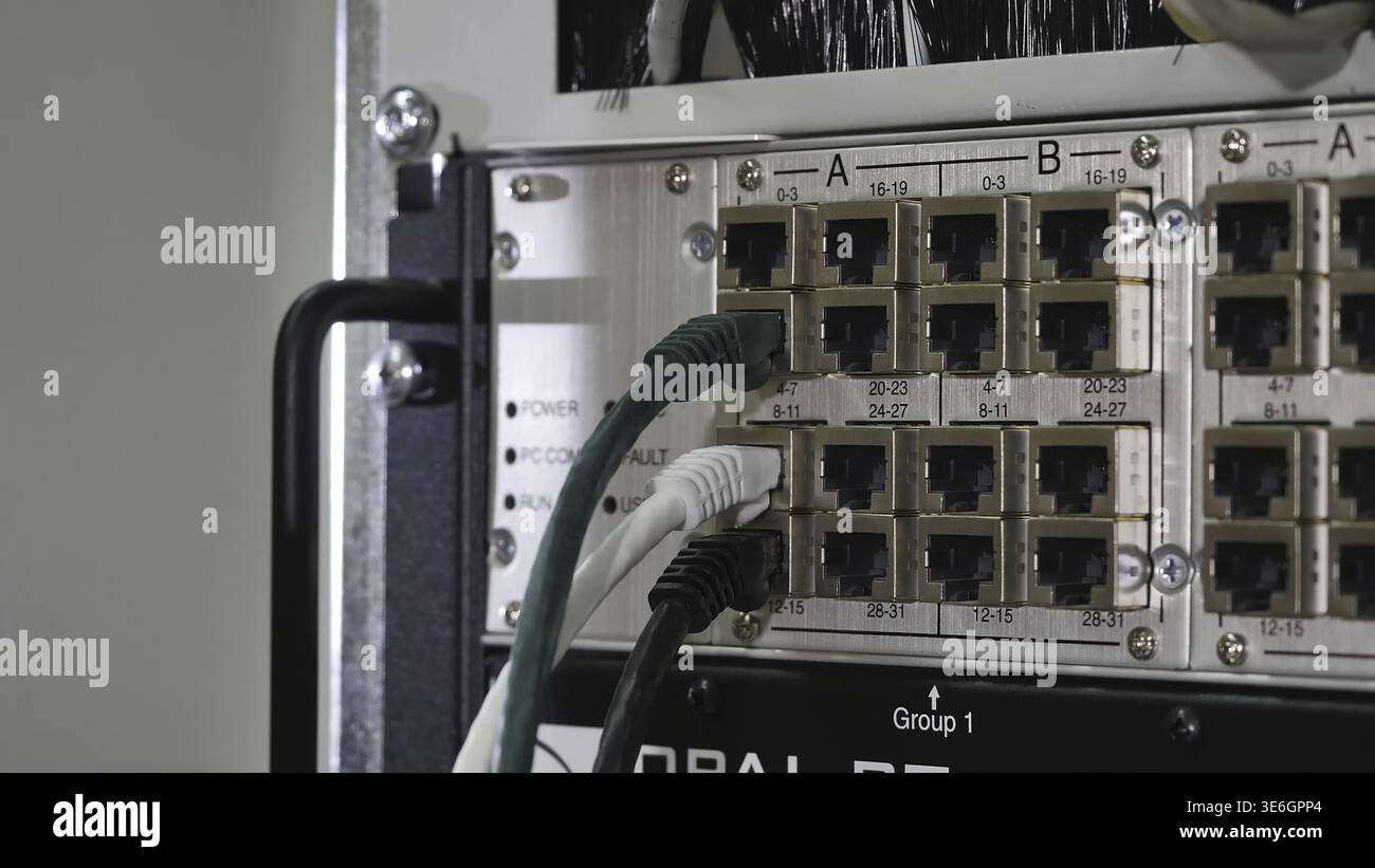 Networking service. network engineer administrator checking server hardware equipment of data center Stock Photo