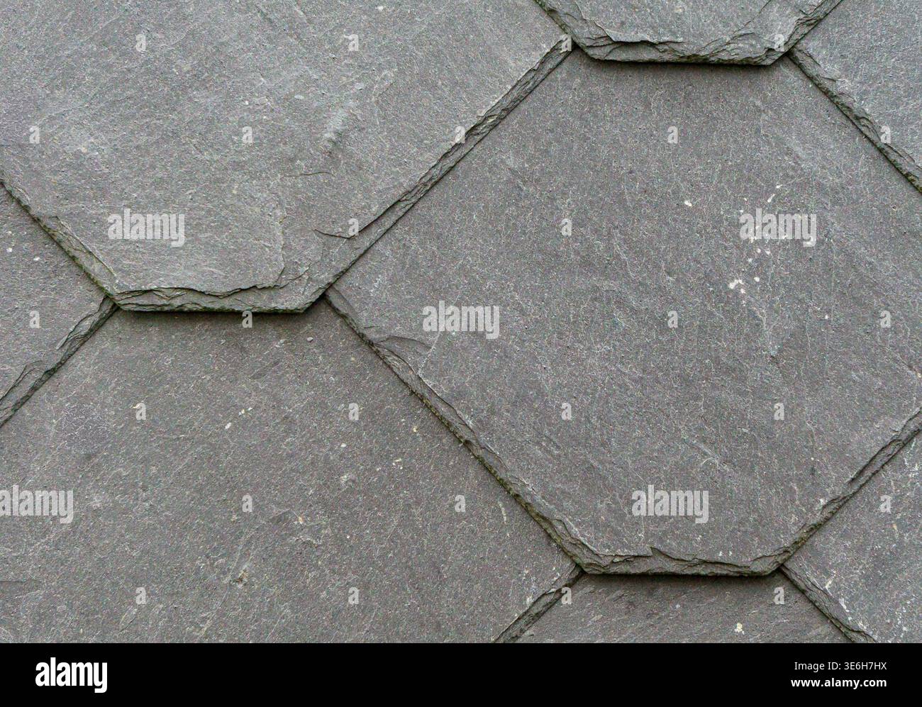 Hexagonal slate stone tile pattern background Stock Photo