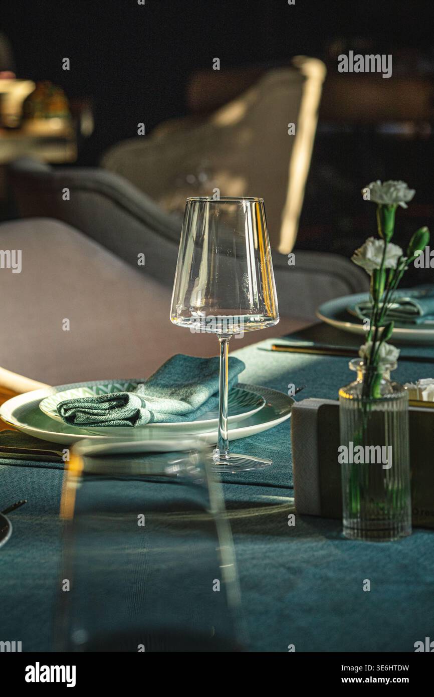 Elegant table setting with wine glass and decor Stock Photo