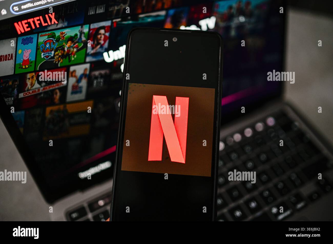 In this photo illustration, a Netflix logo is seen displayed on a ...