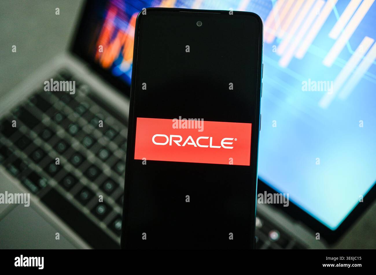 In this photo illustration ,a Oracle logo is seen displayed on a ...