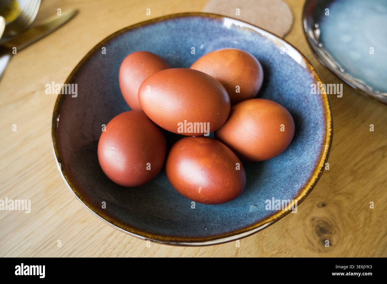 Boiled eggs, the shell color obtained after boiling in onion skins. Easter. Stock Photo