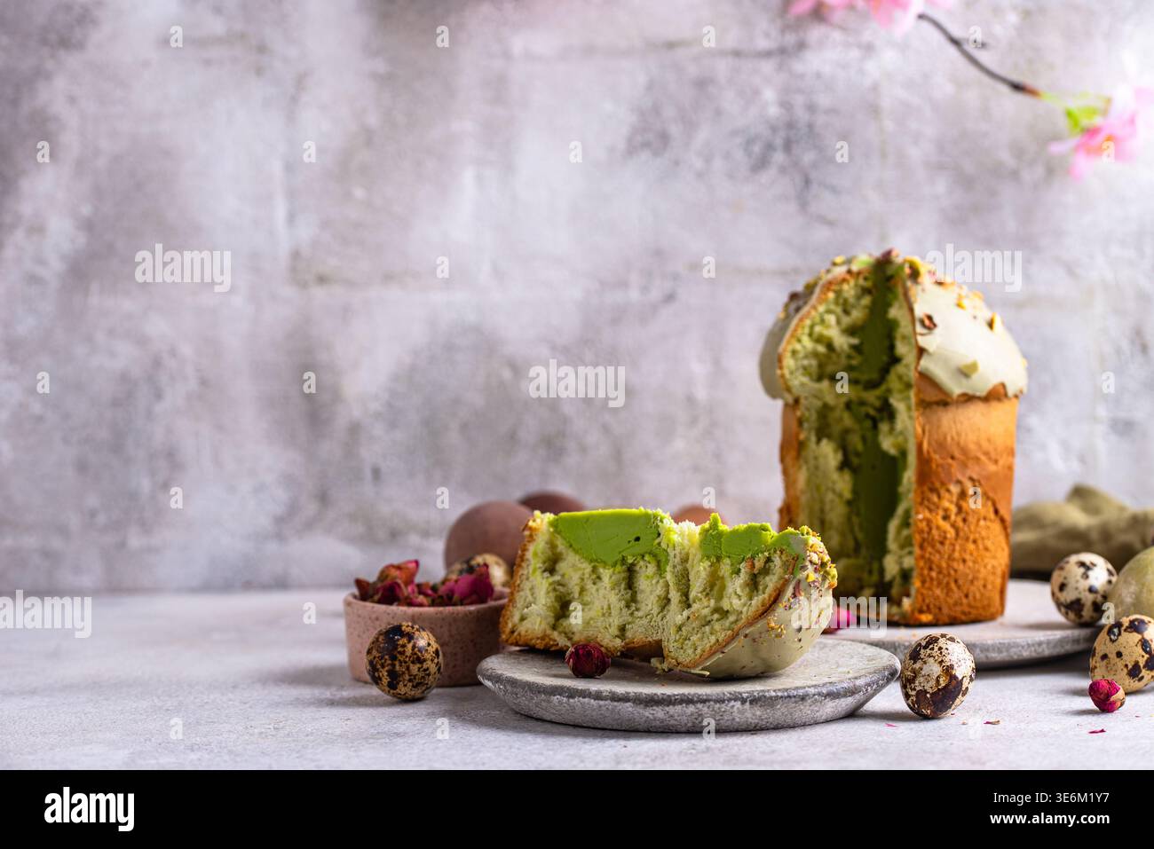 Traditional Easter cake kulich with pistachio Stock Photo
