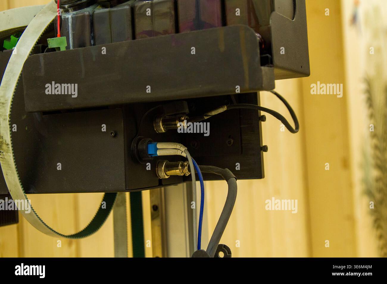 The image displays a close-up of a high-tech industrial or experimental apparatus, likely a component of a 3D printer or specialized imaging system Stock Photo