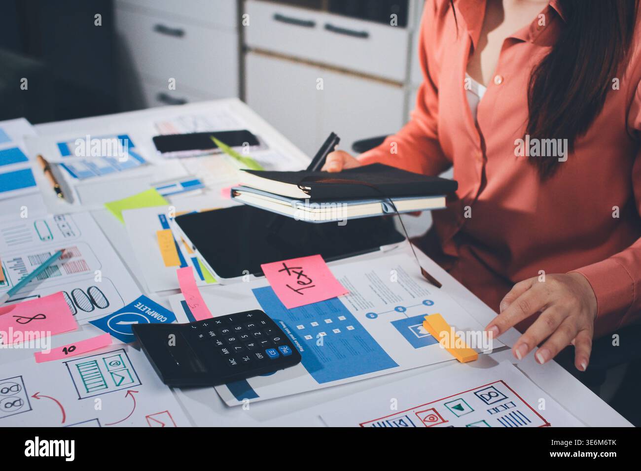team of UI UX web designer are working together to develop mobile ...