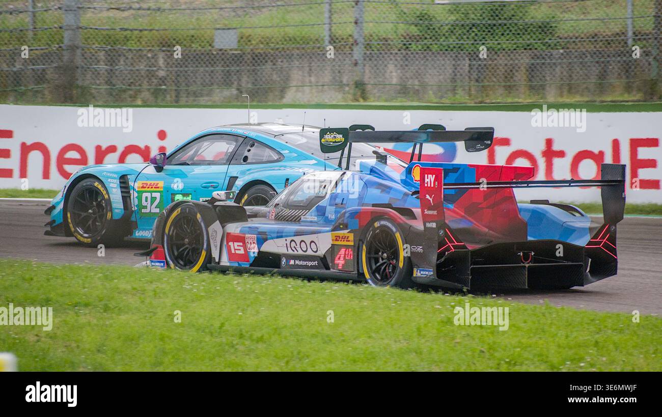 Rear view of #92 Manthey Porsche LMGT3 and #15 BMW M Team WRT Hypercar ...