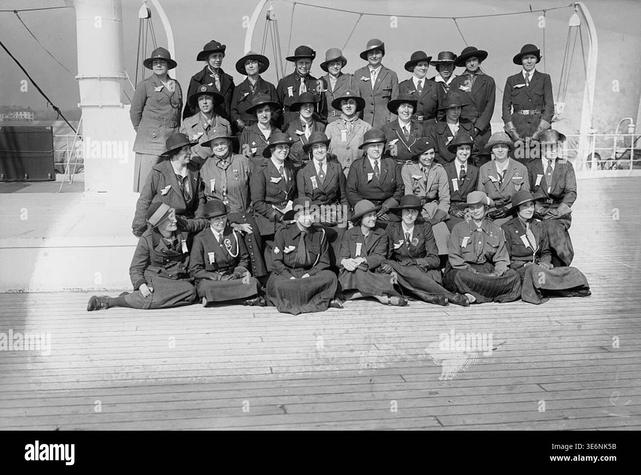 Edith Mbach Group of European Girl Guides in uniform gathered aboard a ship while ...