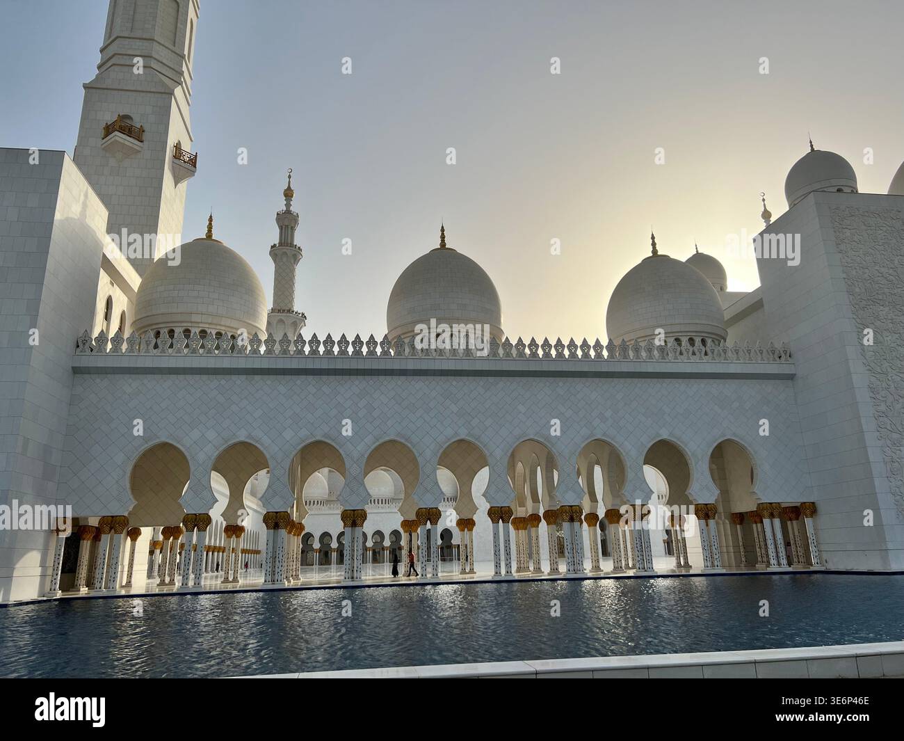 Side courtyard view of Sheikh Zayed Grand Mosque in Abu Dhabi, United Arab Emirates. - Smartphone Captured Stock Image