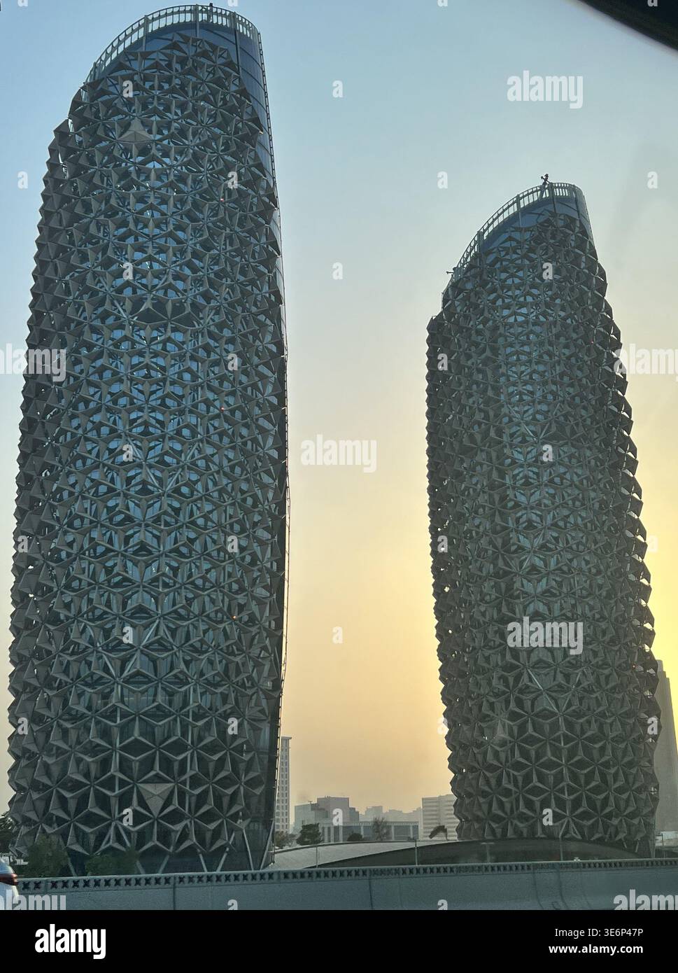 Al Bahar Towers with their distinctive geometric facade in Abu Dhabi, United Arab Emirates. - Smartphone Captured Stock Image
