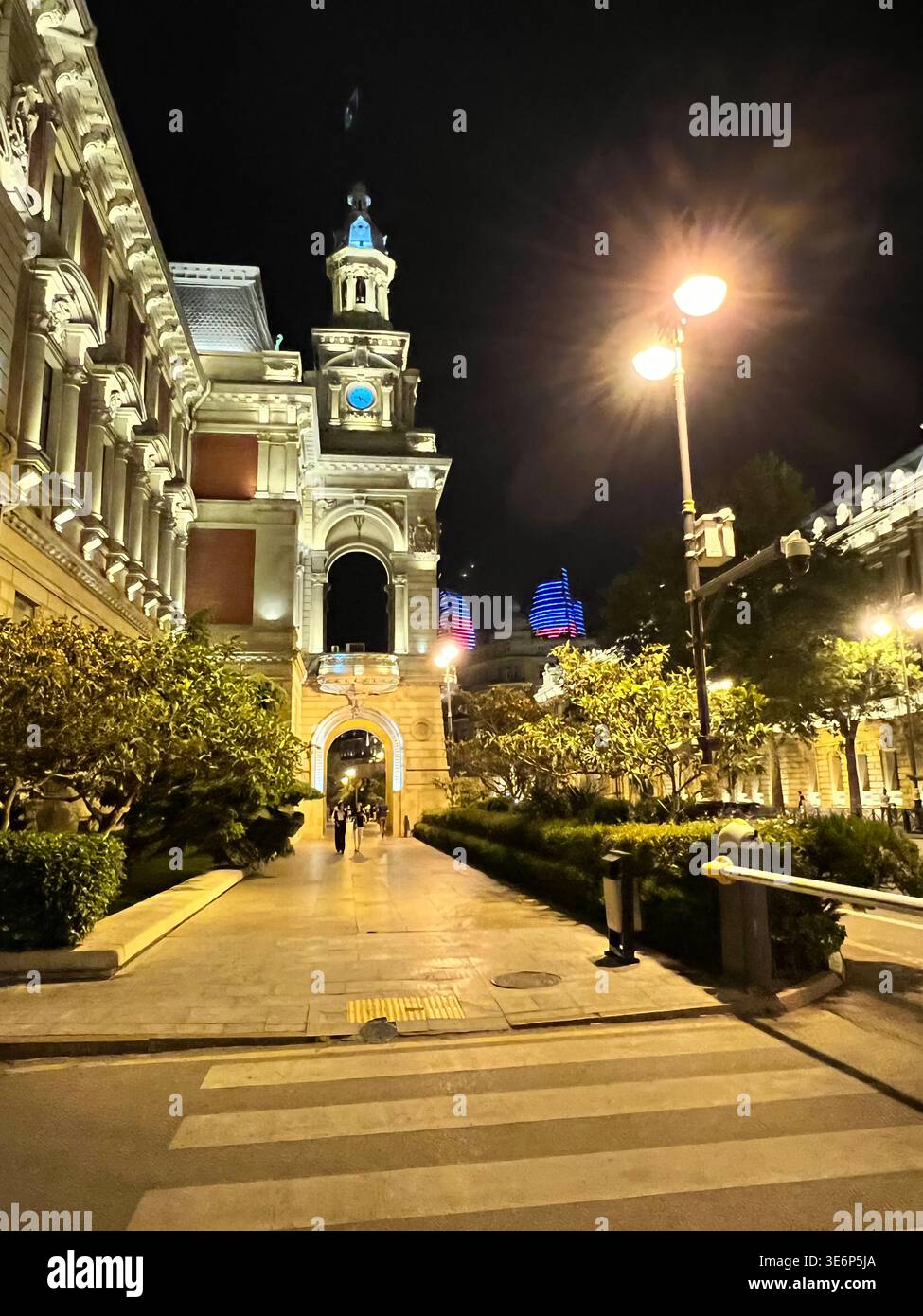 Night view of the Baku City Executive Power building with the Flame Towers in the background, Baku, Azerbaijan. - Smartphone Captured Stock Image