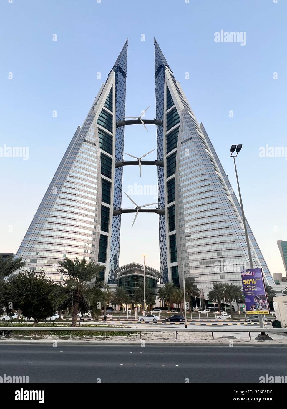 Bahrain World Trade Center in Manama, Bahrain, with its distinctive wind turbines between the twin towers. - Smartphone Captured Stock Image
