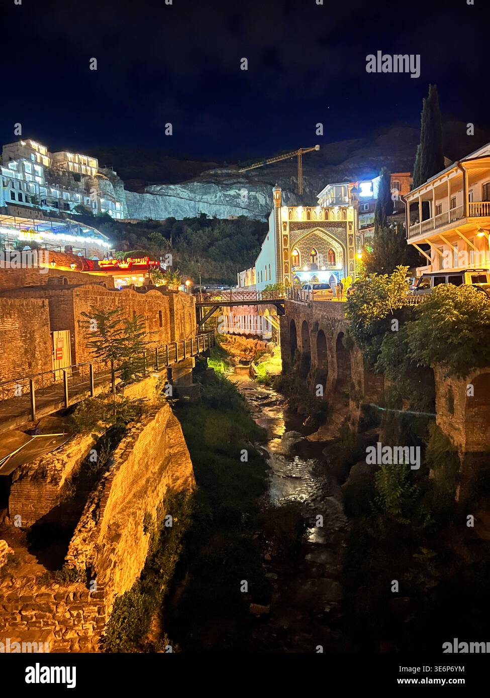 Night view of the Abanotubani gorge and the Tbilisi mosque in Old Tbilisi, Georgia. - Smartphone Captured Stock Image