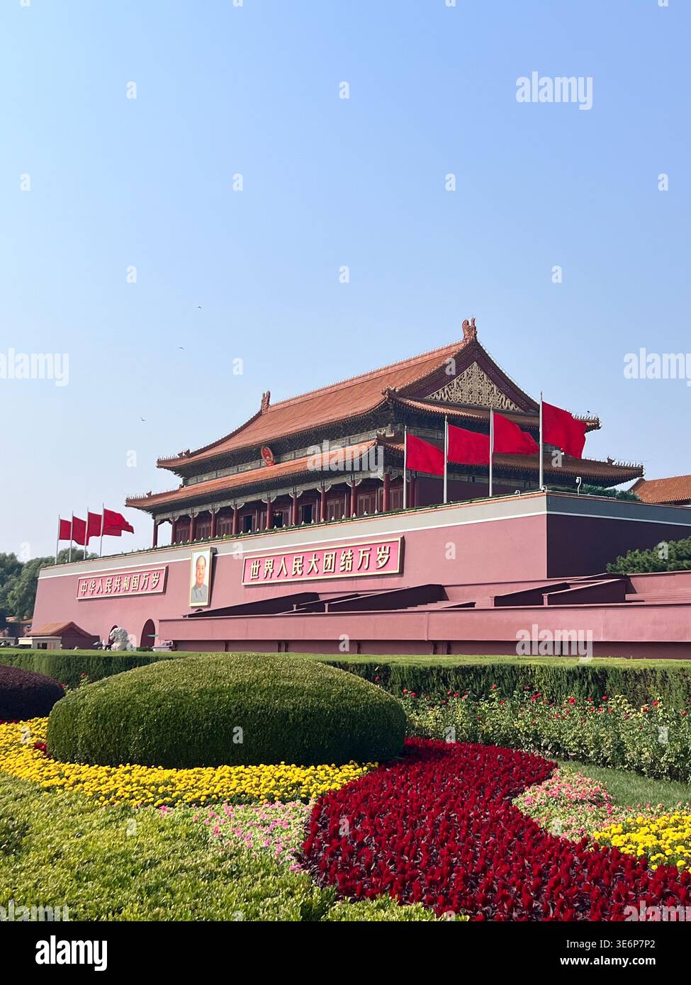 Tiananmen Gate with flowerbeds and flags in Beijing, China. - Smartphone Captured Stock Image