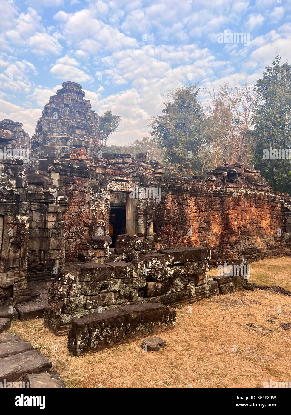 Stone ruins and outer wall at Banteay Kdei in Siem Reap, Cambodia. - Smartphone Captured Stock Image