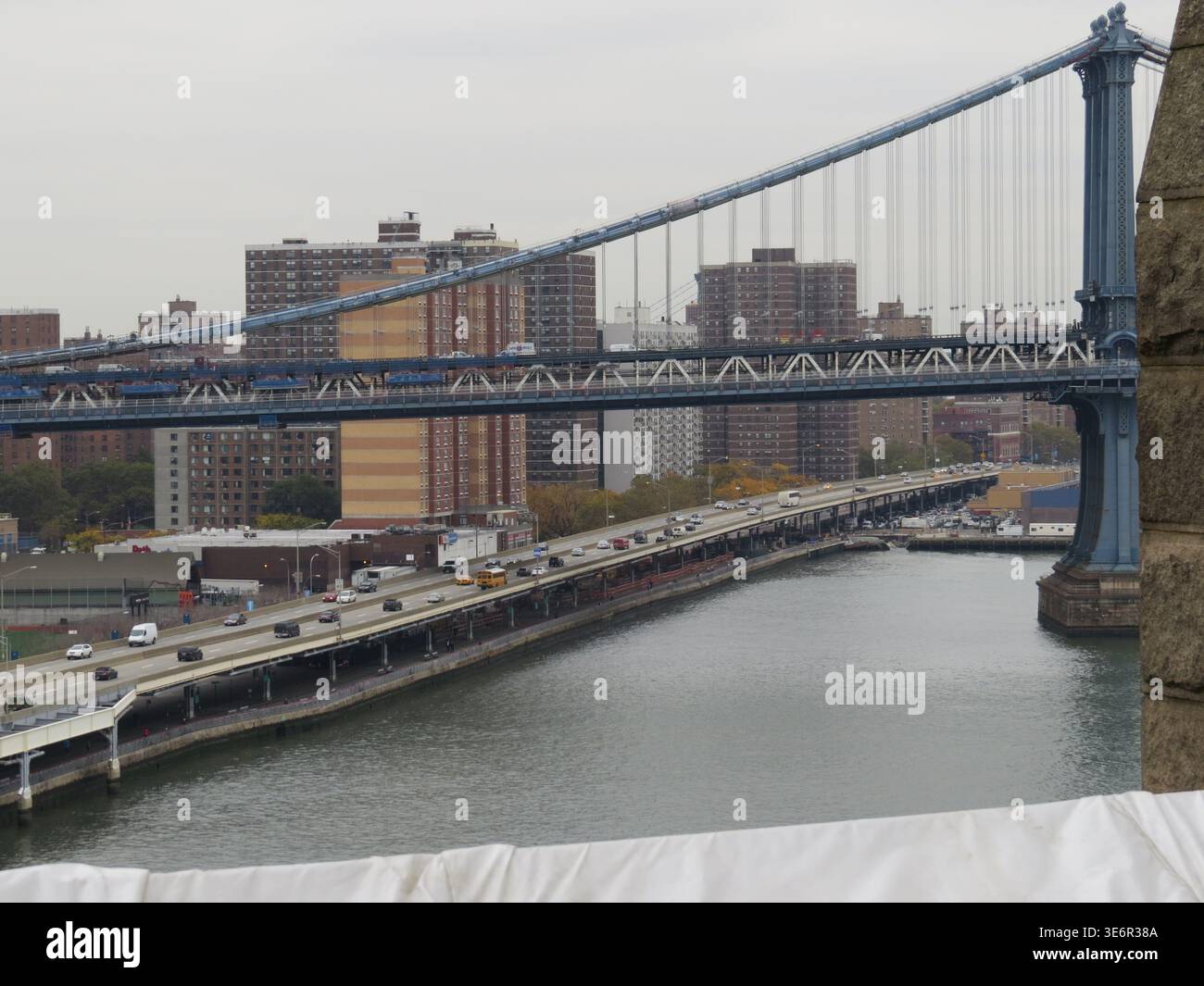 NEW YORK,USA-OCTOBER 24, 2012 Suspension Bridge Over River With Traffic Capturing Busy Commuter Corridor, Multilane Roadway, Moving Stock Photo
