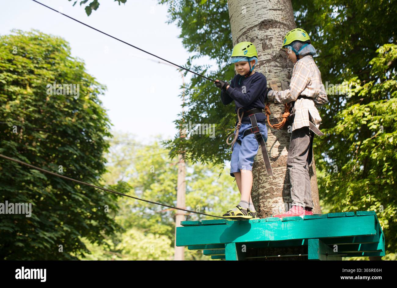 Children wearing safety harness hi-res stock photography and images - Alamy