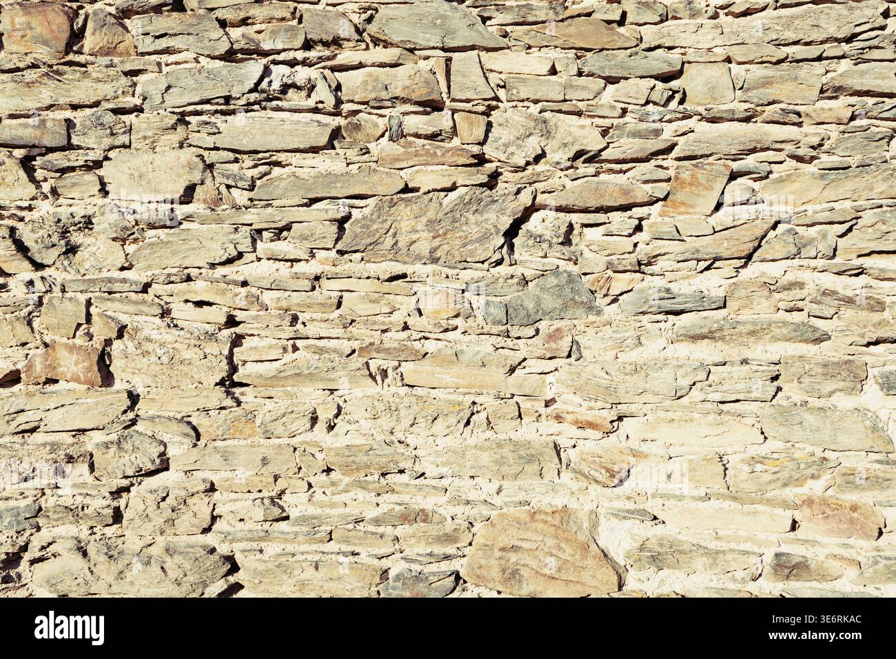 A high-resolution architectural texture showcasing an ancient stone ...