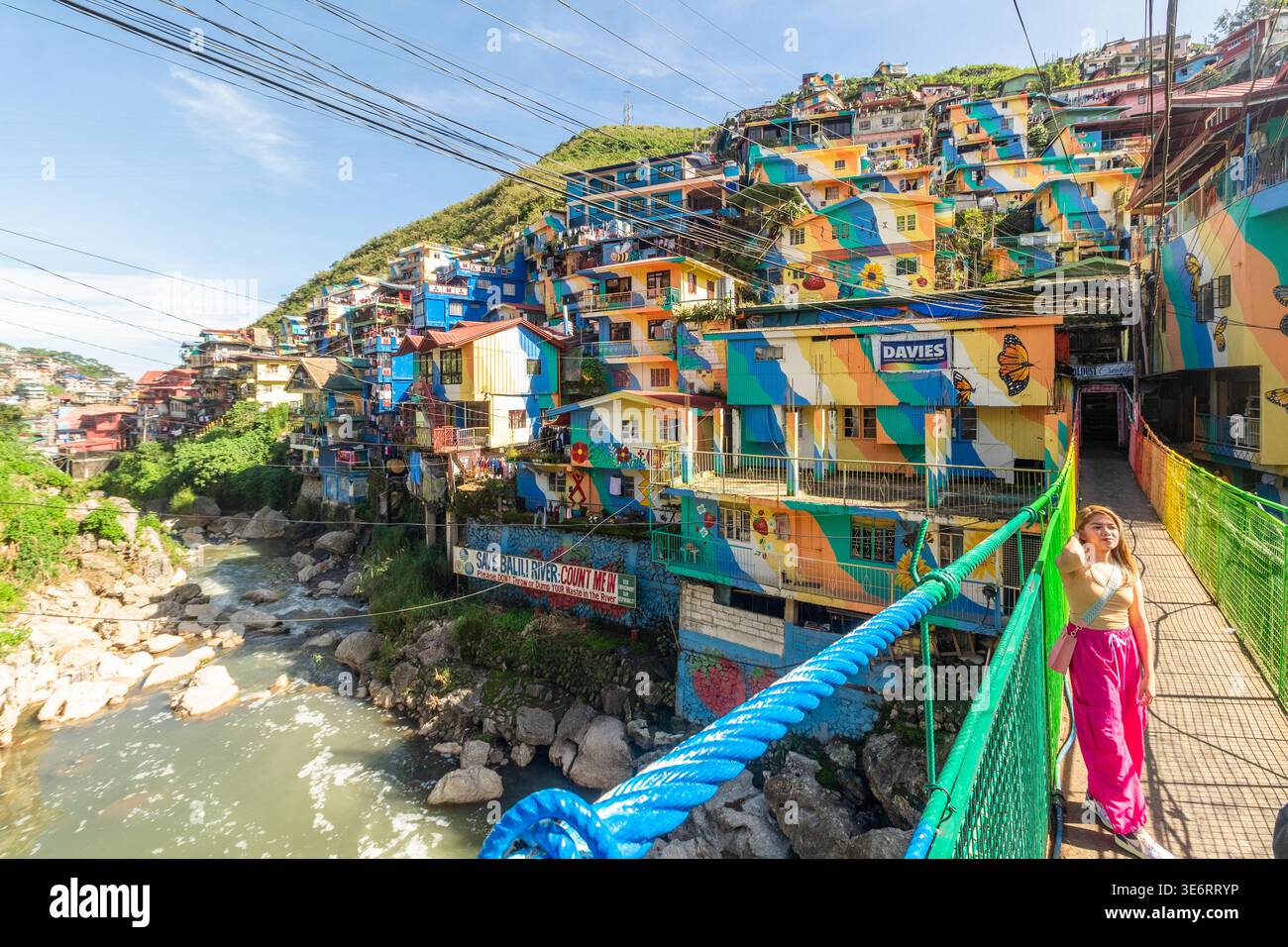 Colorful painted houses climbing a hillside, known as the "Colors of StoBosa," in La Trinidad, Benguet, Philippines Stock Photo