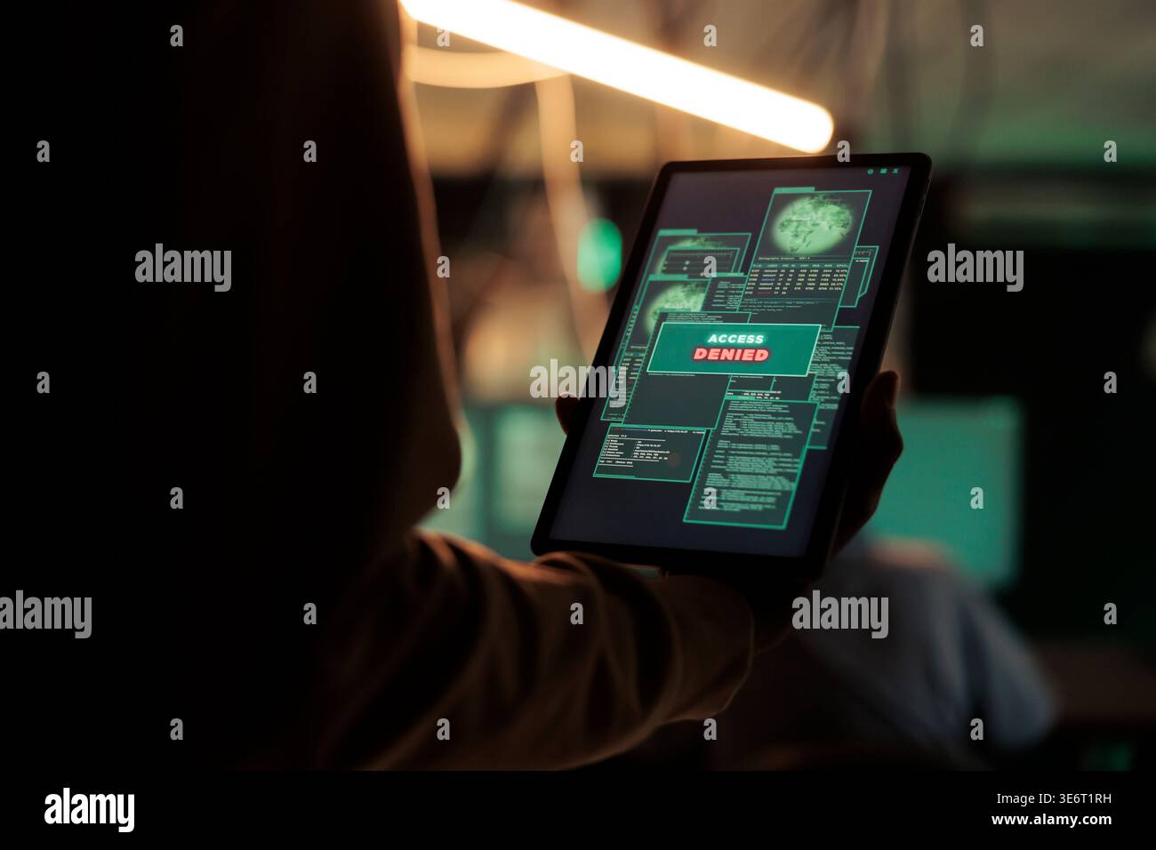 Access denied message on digital tablet screen, unsuccessful password cracking, database hacking fail. Cyberattack, internet thief stealing electronic information, using malicious software Stock Photo