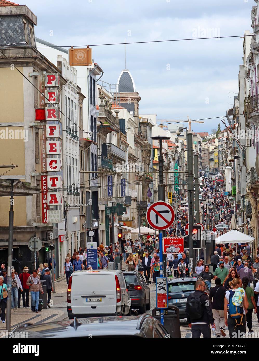 Rua de 31 de Janeiro shopping street in central Porto, Portugal, looking downhill through the historic city. Stock Photo
