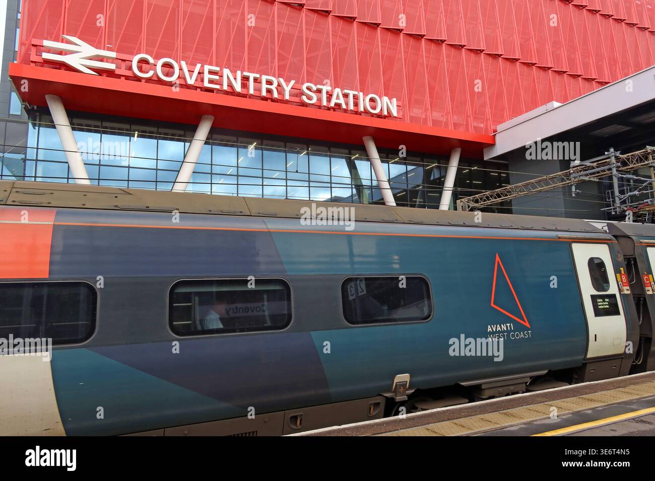 Avanti West Coast train beneath Coventry station signage as the intercity operator approaches public ownership in 7th March 2027. Stock Photo