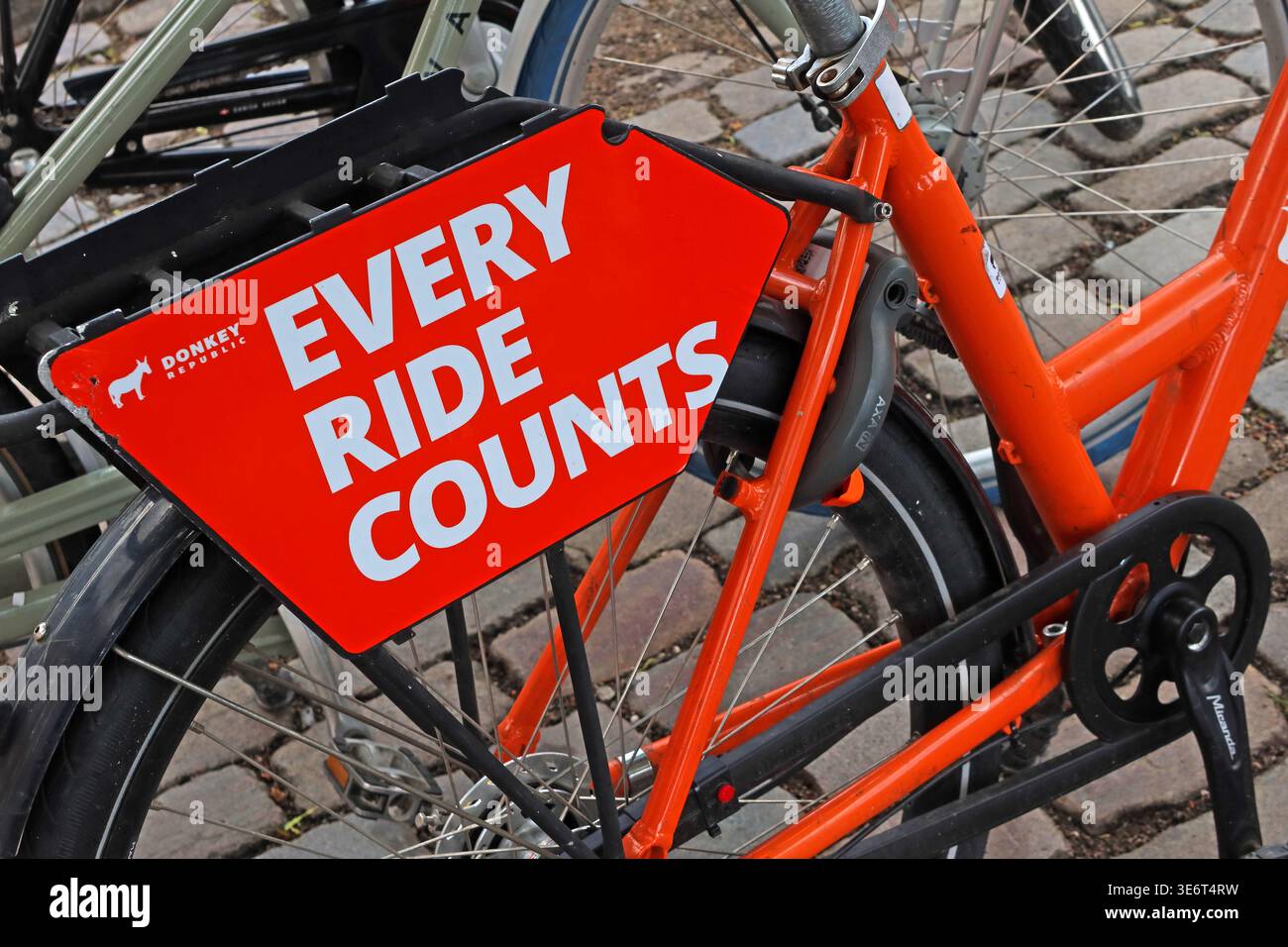 Every Ride Counts message on a shared bicycle in Copenhagen, Denmark, promoting everyday cycling. Stock Photo