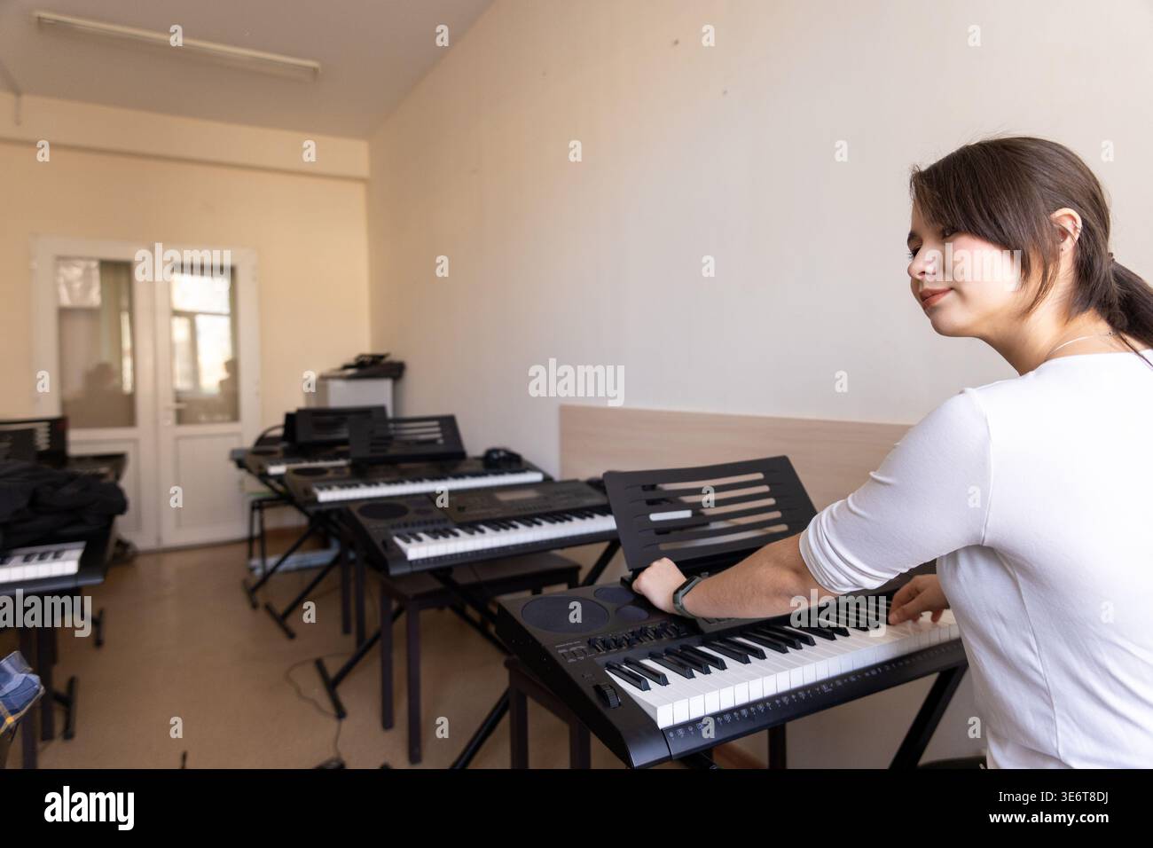Music classroom with multiple instruments Stock Photo