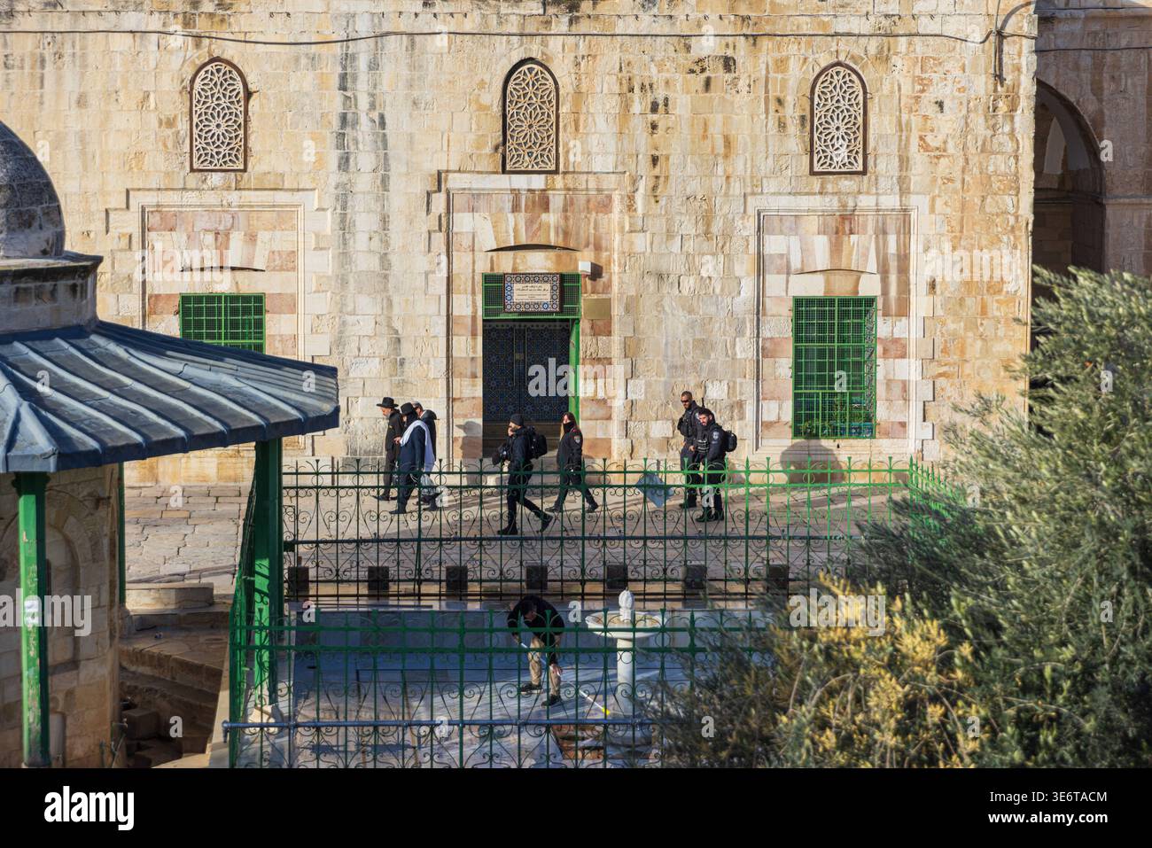JERUSALEM, ISRAEL - DECEMBER 31, 2025: Jewish Israelis walking the Temple Mount escorted by Israeli military. Jewish Israelis walking the Temple Mount Stock Photo