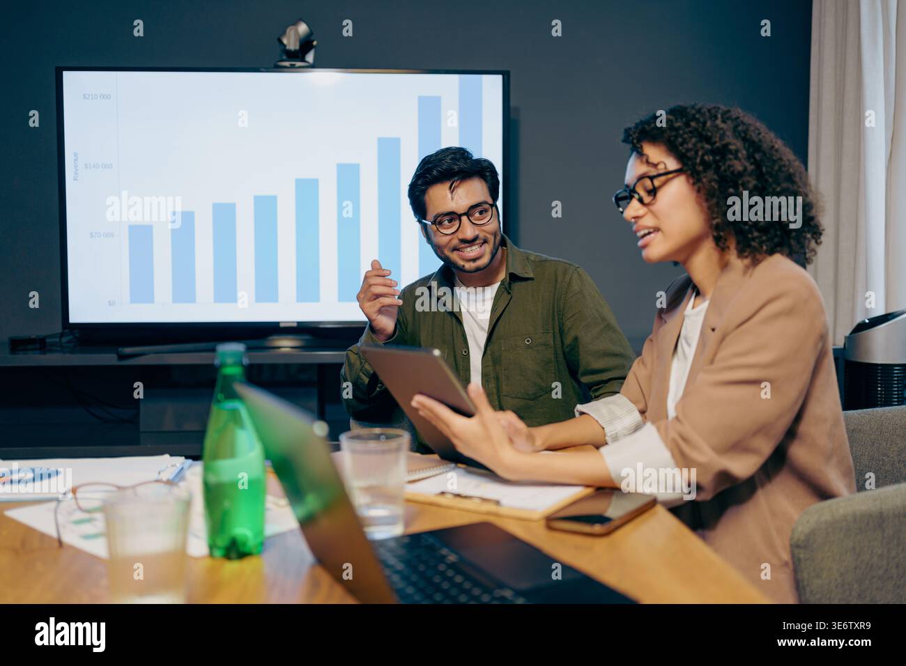 Team Analyzes Data, Professionals Examine Charts And Collaborate On ...