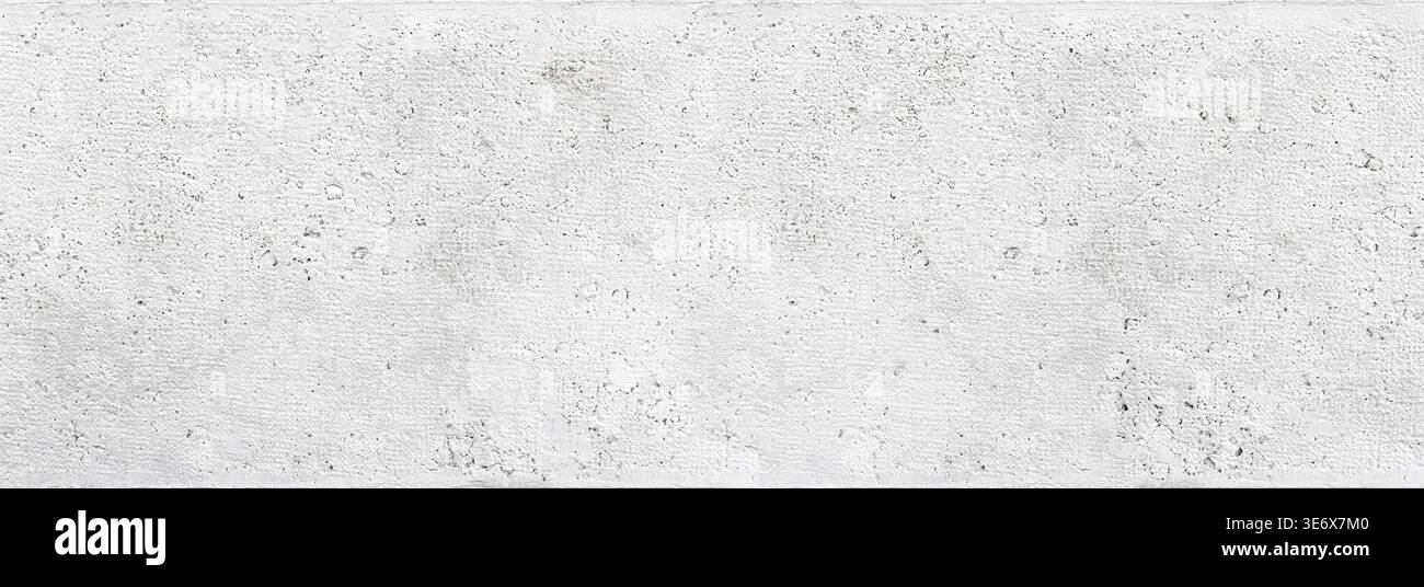 White concrete wall showing textured surface and rough pattern Stock Photo