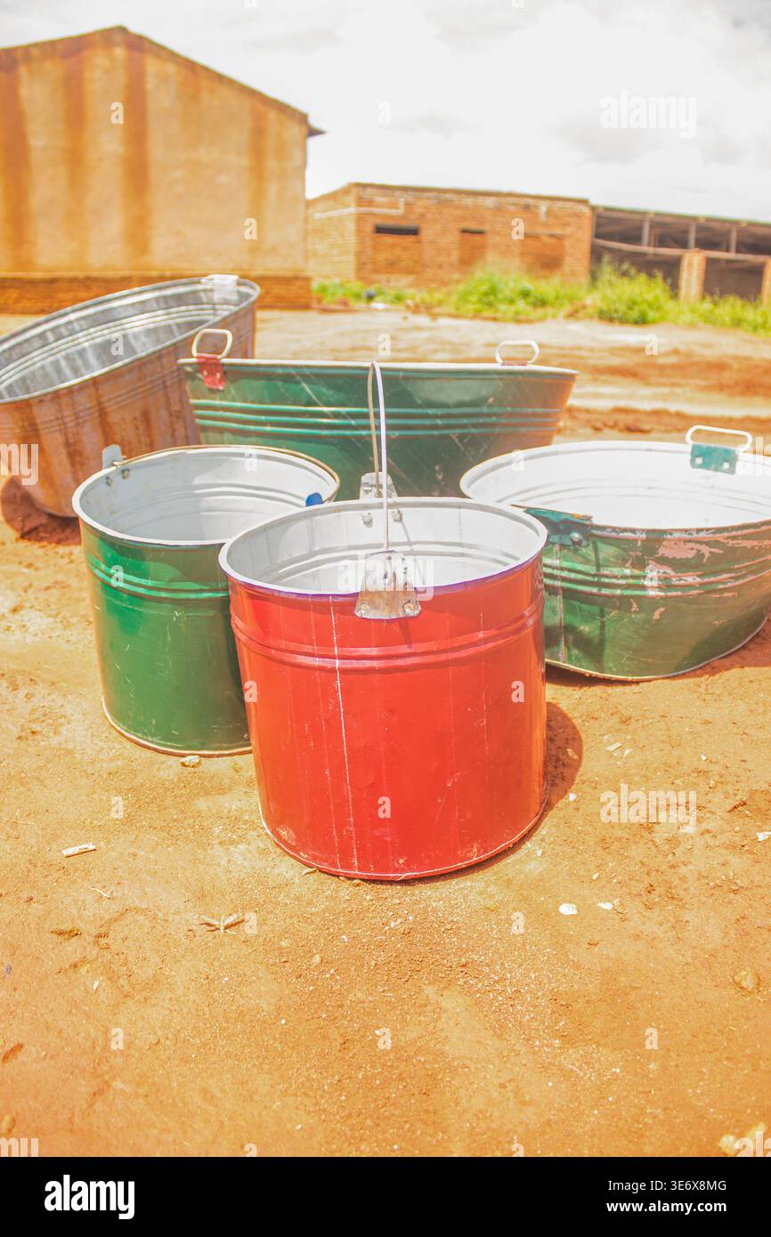 Local Bucket African traditional steel buckets on display at a local market in Sonda ...