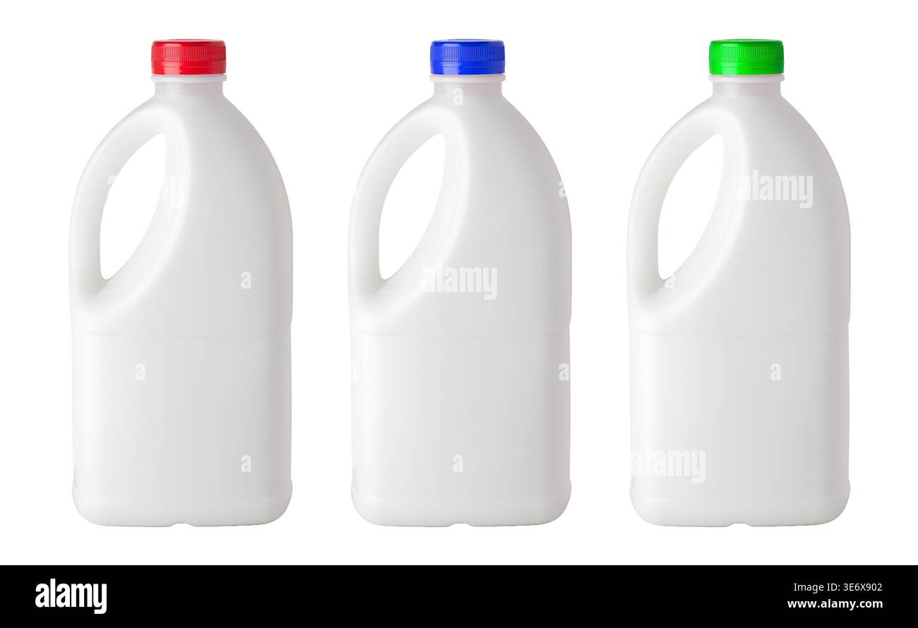 Three plastic jugs displaying different colored caps for various dairy products Stock Photo