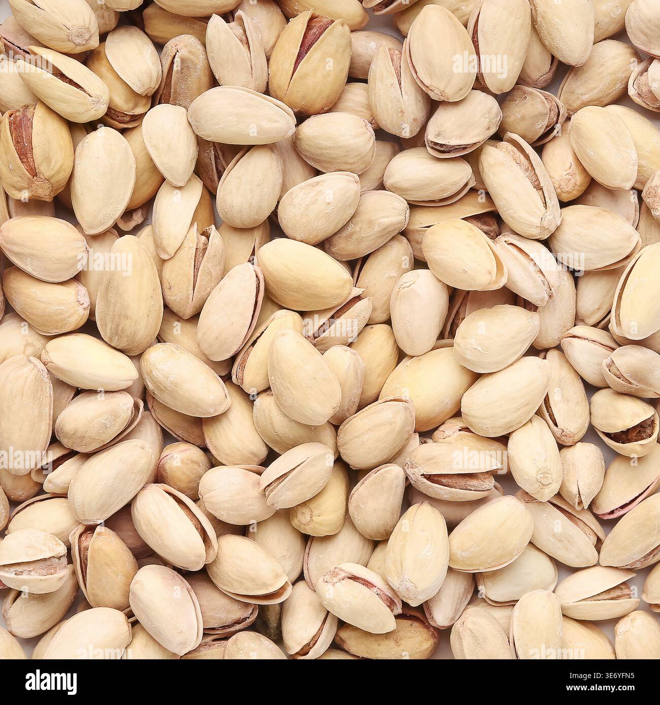 Pistachio nuts in shell texture and background Stock Photo
