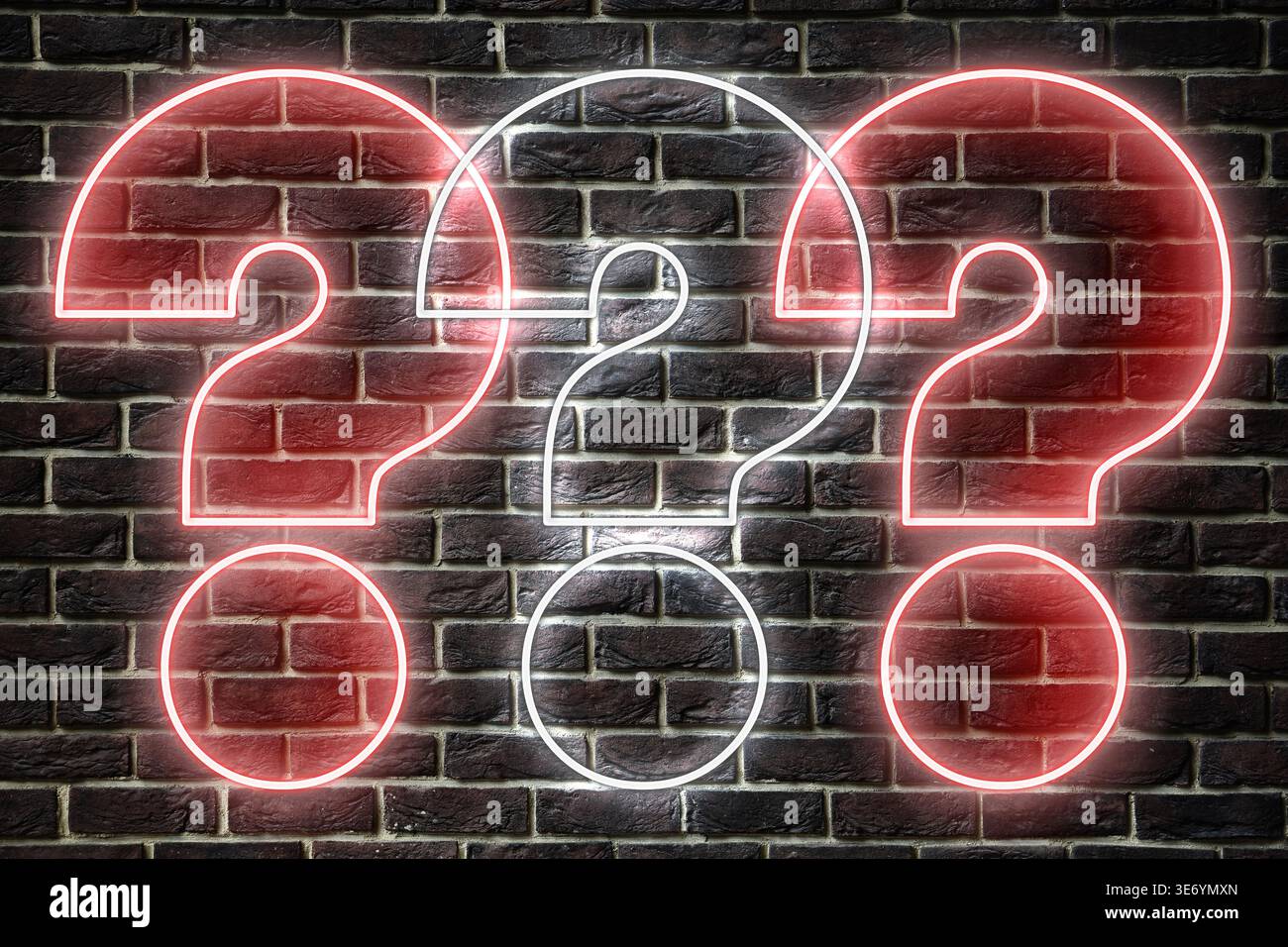Three neon question marks on brick wall Stock Photo